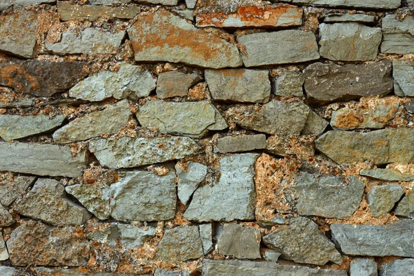 Parede de pedras multicolor — Fotografia de Stock