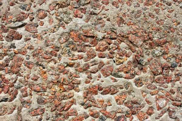 Pedras de granito em concreto — Fotografia de Stock