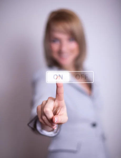 Mujer presionando el botón ON OFF — Foto de Stock