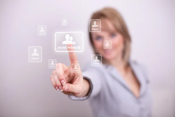 Woman pressing social network button — Stock Photo, Image