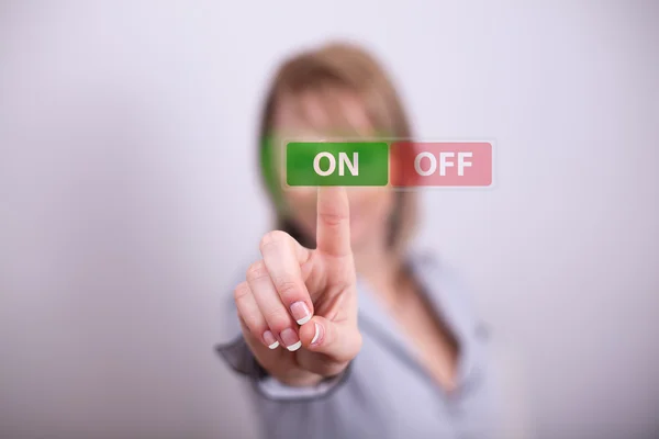 Mulher pressionando no botão OFF — Fotografia de Stock