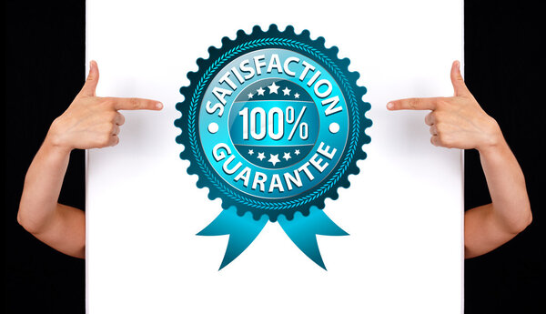 Hand pointing to Satisfaction Guarantee Label