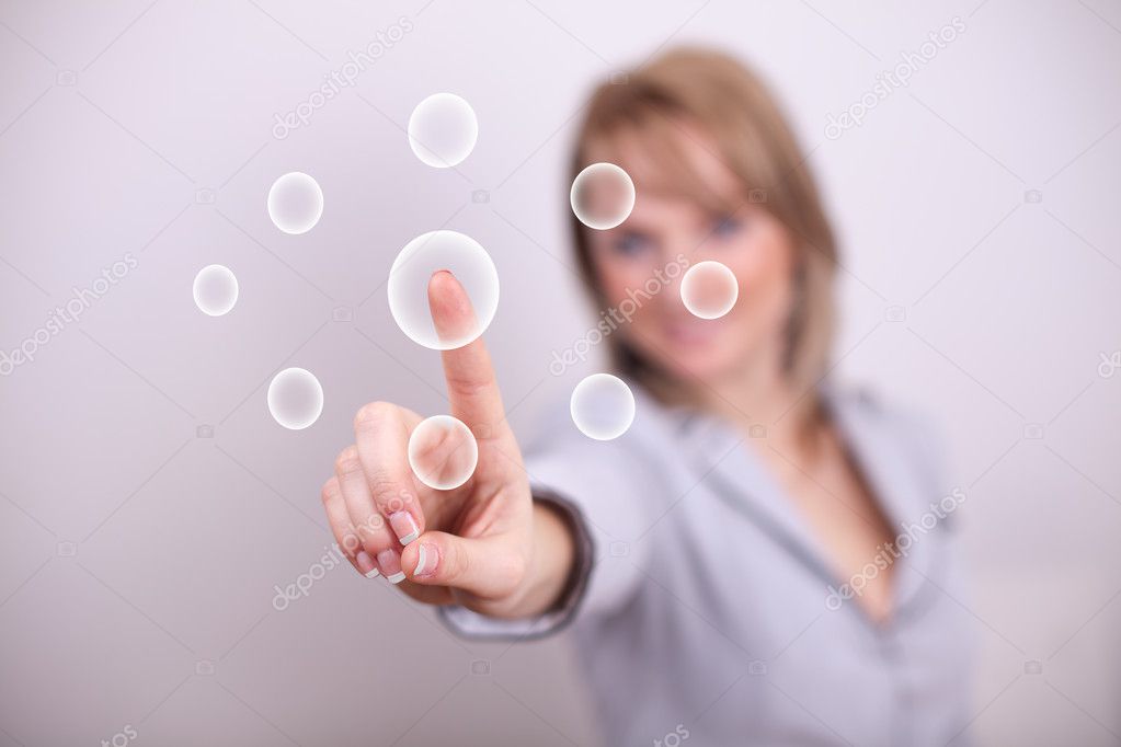 Woman pressing group of buttons