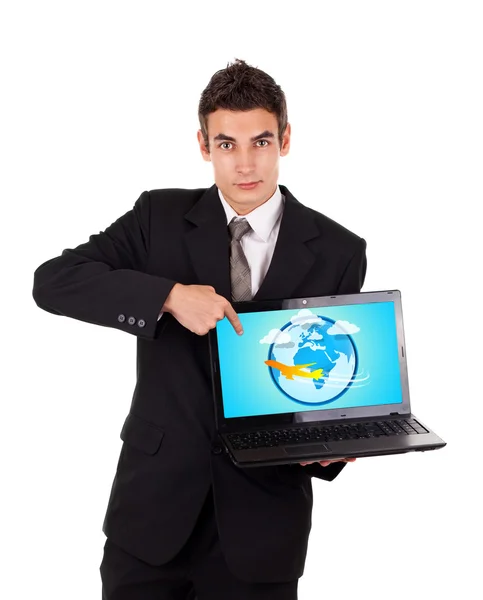 Człowiek biznesu, wskazując na laptopa z samolotem — Zdjęcie stockowe