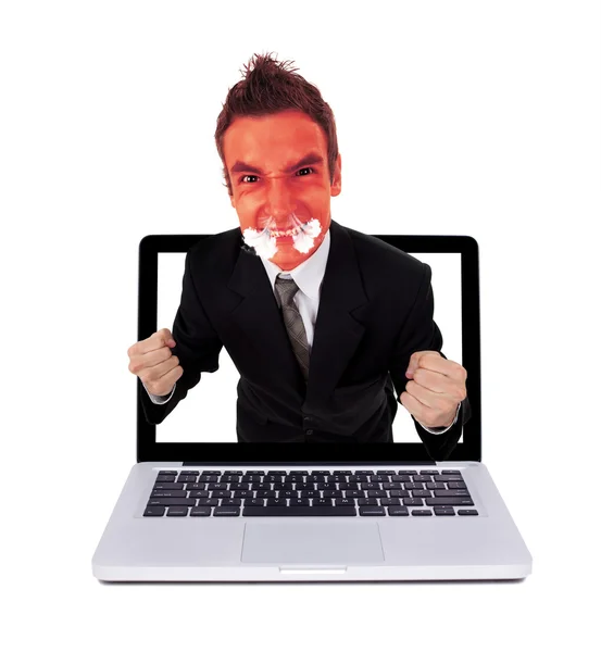 Uomo arrabbiato che esce dal computer portatile — Foto Stock