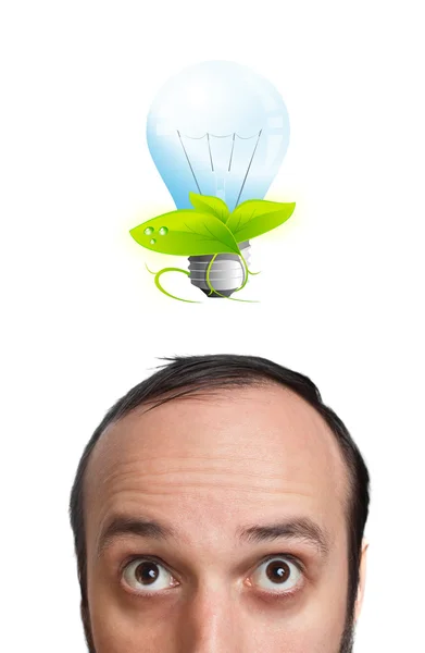 Funny young man with light bulb over his head 2 — Stock Photo, Image