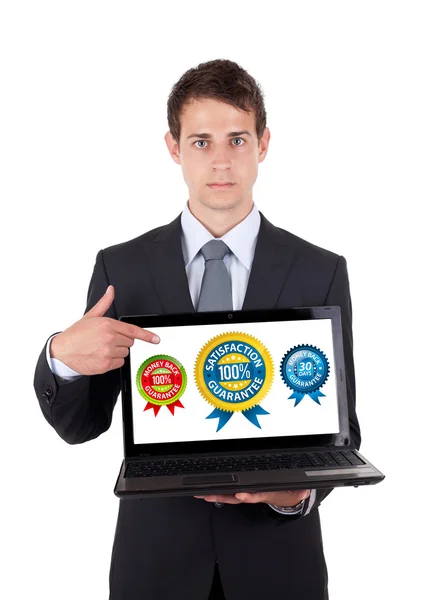 Üzleti ember mutatva laptop számítógép — Stock Fotó