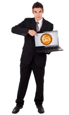 Business man pointing at a colorful sale label 2 clipart