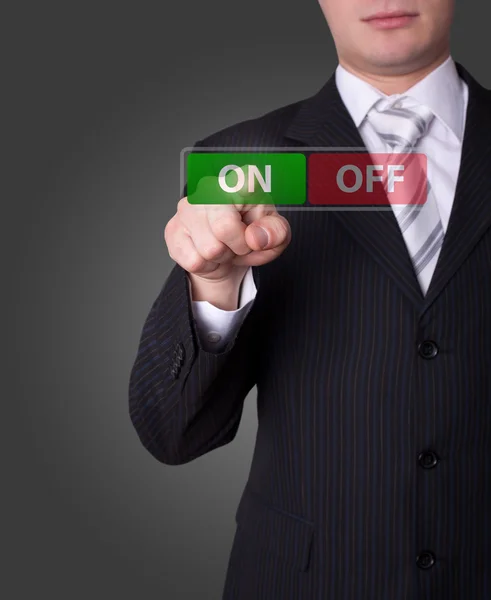 Man pressing ON / OFF button — Stock Photo, Image