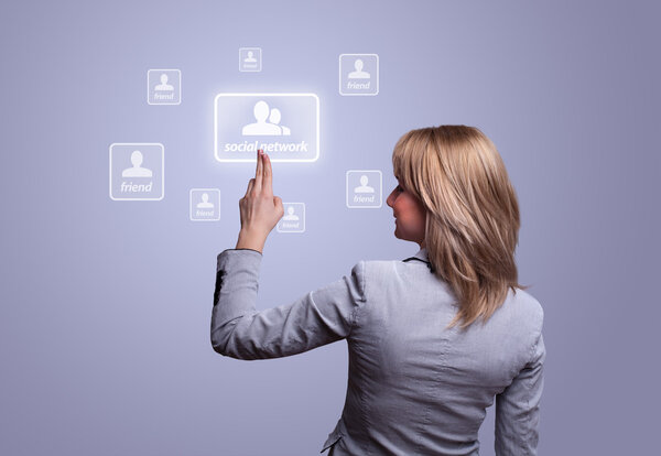 Hand pressing social network icon