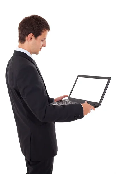 Молодий бізнесмен тримає ноутбук — стокове фото