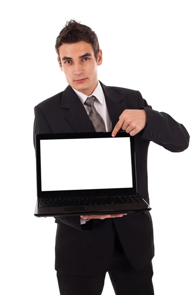 Ο άνθρωπος των επιχειρήσεων δείχνει σε ένα φορητό υπολογιστή — Φωτογραφία Αρχείου
