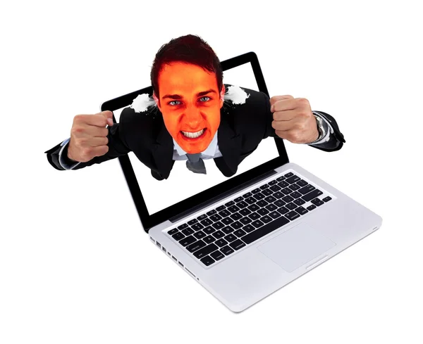 Kızgın adam--dan laptop çıkıyor — Stok fotoğraf