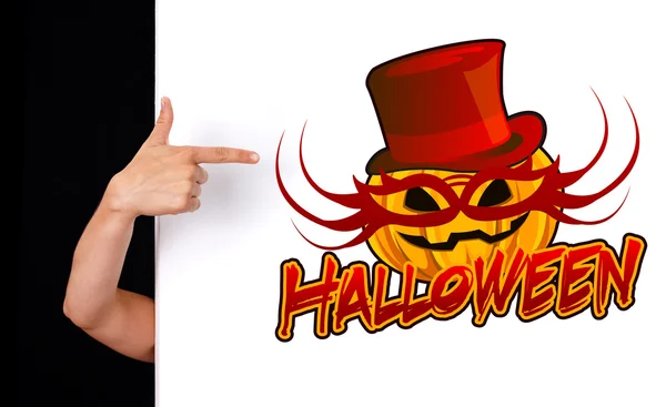 Frauenhand zeigt auf Halloween-Zeichen — Stockfoto
