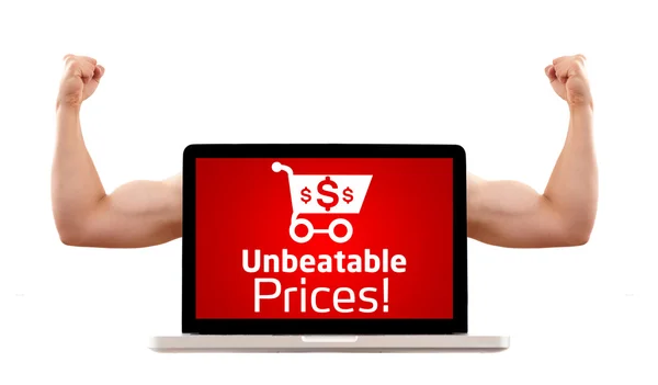 Přenosný počítač s bezkonkurenční ceny a nákupní košík znamení — Stock fotografie