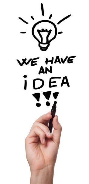 Hand drawing on whiteboard "we have an idea" — Stock Photo, Image