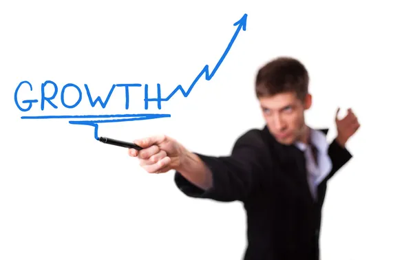 Empresario dibujando una flecha ascendente, que representa el crecimiento del negocio —  Fotos de Stock