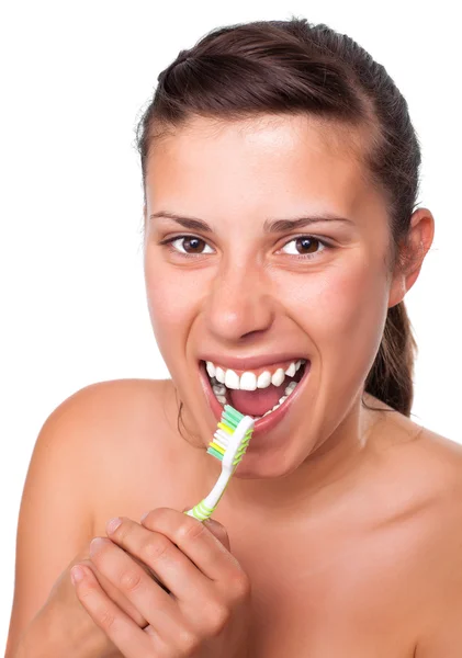 Menina brincando com sua escova de dentes — Fotografia de Stock