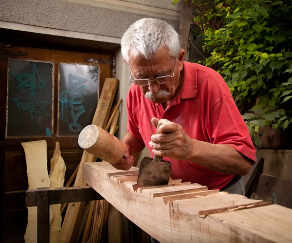 stock image Woodcarver working with mallet and chisel 5