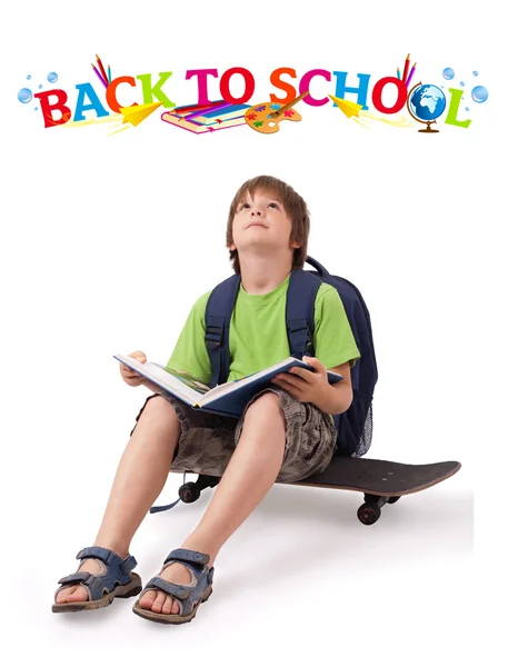 Kid on skateboard with back to school theme isolated on white — Stock Photo, Image