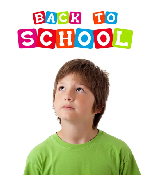 Boy looking with back to school theme isolated on white — Stock Photo, Image