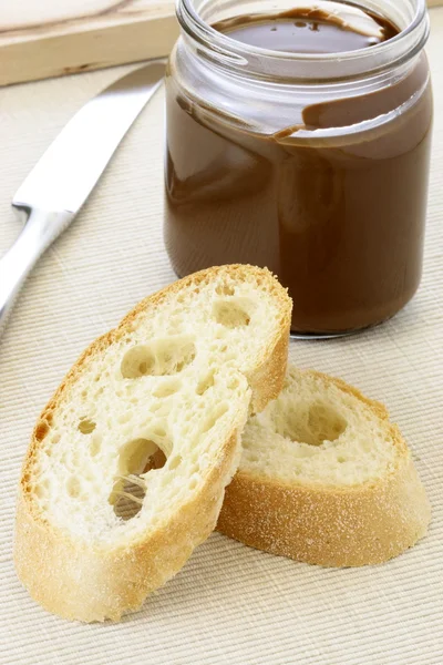 Fresh and delicious french baguette and hazelnut spread — Stock Photo, Image
