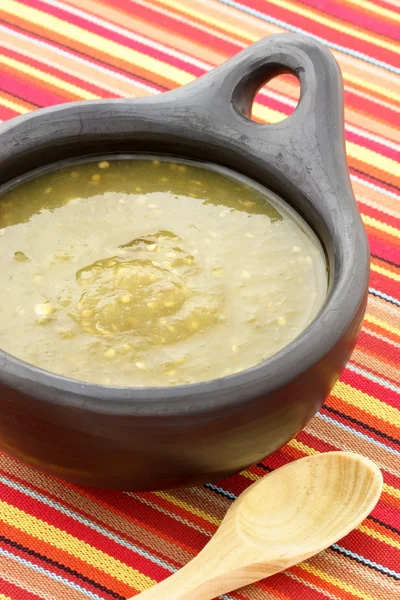 Tomatillo sauce in colombian clay dish — Stock Photo, Image