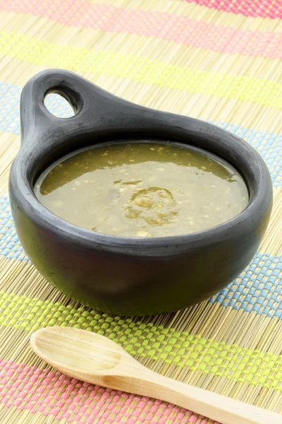 Stock image Tomatillo sauce in colombian clay dish