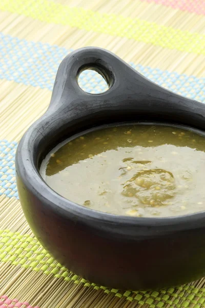 stock image Tomatillo sauce in colombian clay dish