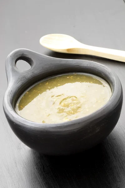 stock image Tomatillo sauce in colombian clay dish