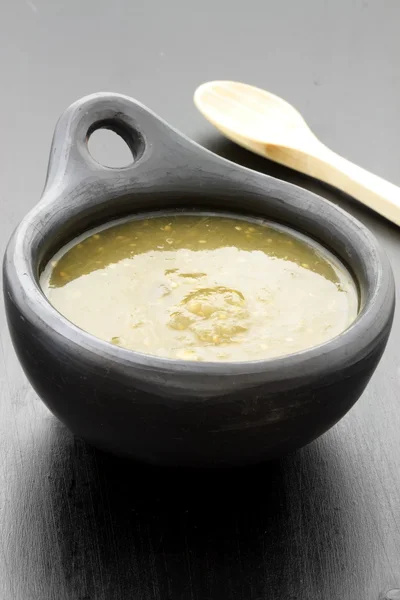 stock image Tomatillo sauce in colombian clay dish