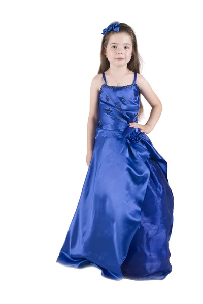 Portret van het kleine meisje, in een donker blauwe jurk — Stockfoto