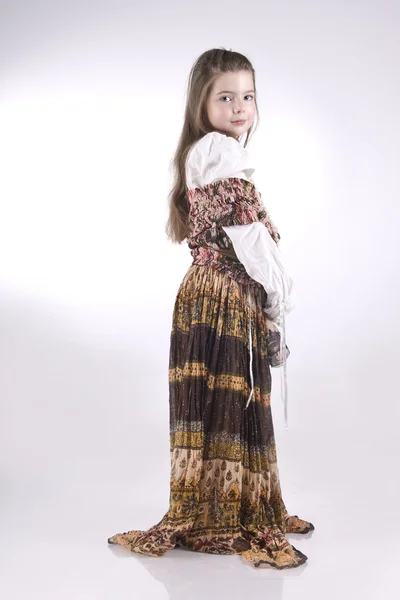 Dziewczynka w sukni z ozdoby — Zdjęcie stockowe