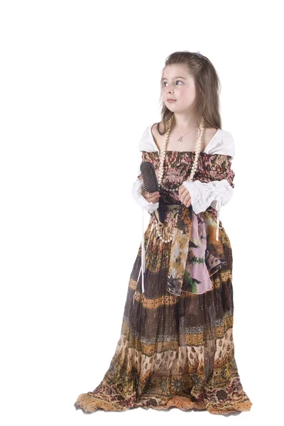 La bambina in un vestito con ornamenti — Foto Stock