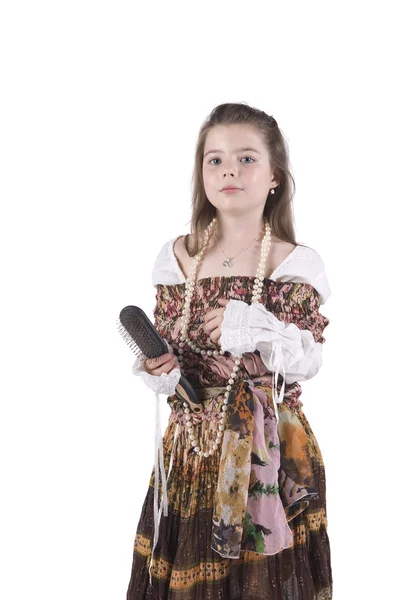 La bambina in un vestito con ornamenti — Foto Stock