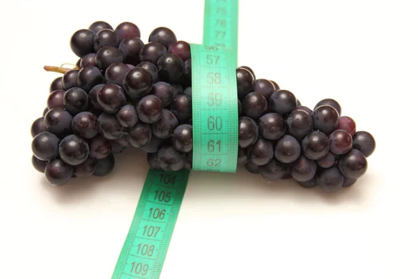 Fita métrica em torno de uvas — Fotografia de Stock