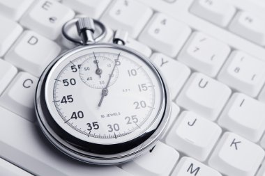 Stopwatch on white keyboard clipart