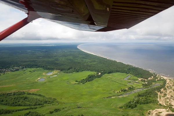 stock image Land view from plane cabin