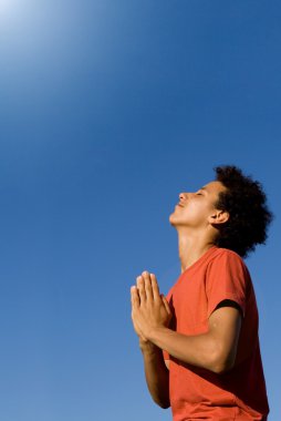 Mixed race christian teen praying clipart