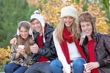 Happy autumn or fall group of teens clipart