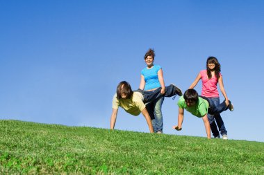 Wheelbarrow race at summer camp clipart