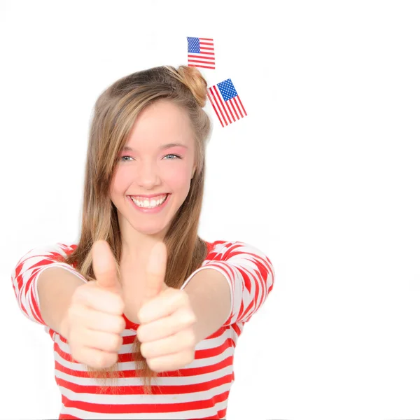 stock image Beautiful American young woman celebrating 4th of july with flag