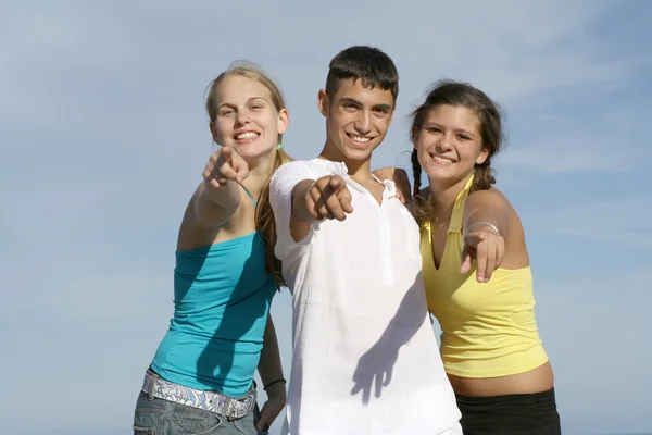 Teens pointing Stock Photo
