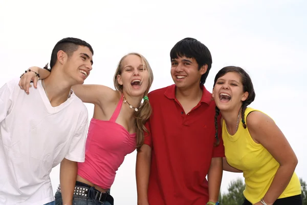 Happy group of teens or students Stock Image