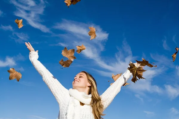 Autumn woman arms raised in happiness — Stock Photo, Image