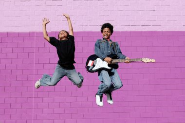 Happy african descent kids playing music clipart