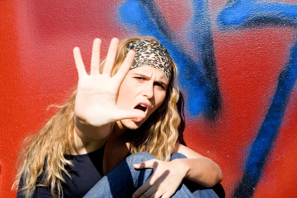 Angry rebellious teen hand up to say no — Stok fotoğraf