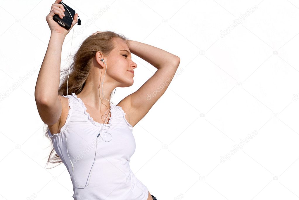Young woman or teen dancing to music from personal stereo