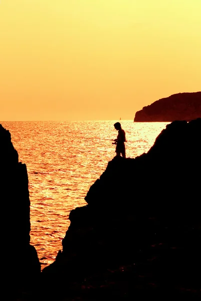 Fishing at dusk or dawn in mallorca spain — Stock Photo, Image