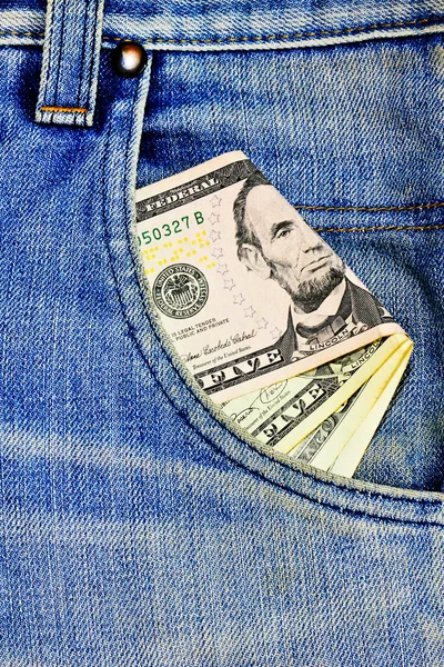 Доллар США в кармане джинсов — стоковое фото